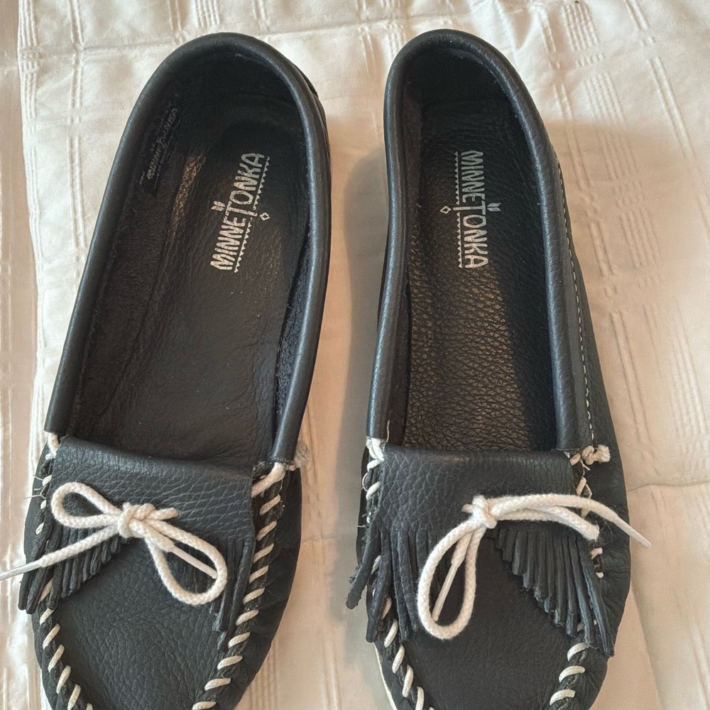 Minnetonka Black Leather Slip-On Moccasins with White Laces